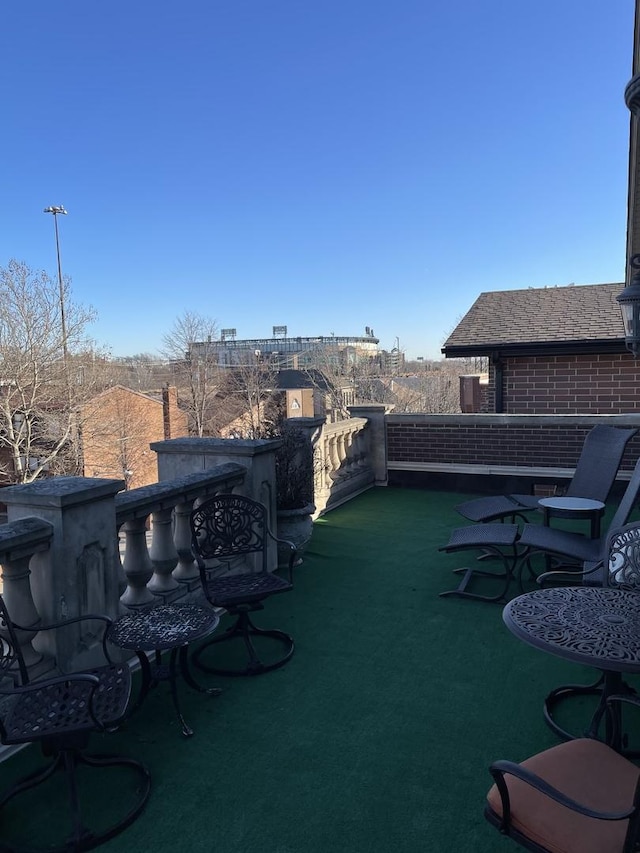 view of patio / terrace with a balcony