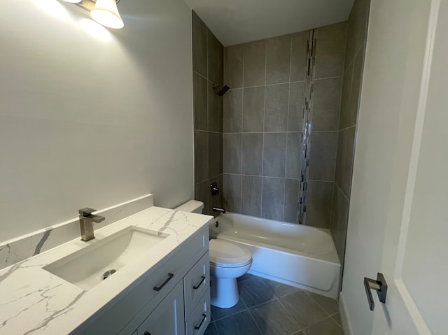 full bath with toilet, bathtub / shower combination, vanity, and tile patterned floors