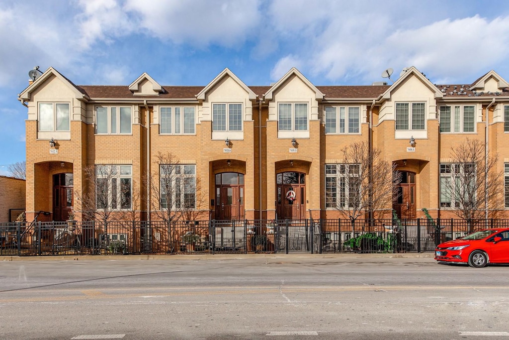 7610 W Irving Park Rd Unit A, Norridge, IL 60706 - multi unit property with brick siding and fence private yard