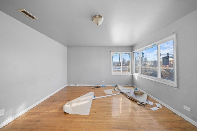16159 Wood St, Markham, IL 60428 - empty room with wood-type flooring and baseboards