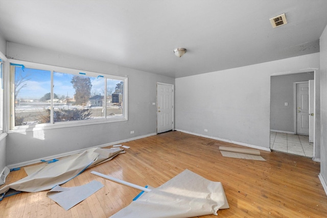 16159 Wood St, Markham, IL 60428 - spare room featuring hardwood / wood-style floors and baseboards