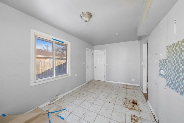 16159 Wood St, Markham, IL 60428 - empty room featuring baseboards and light tile patterned floors