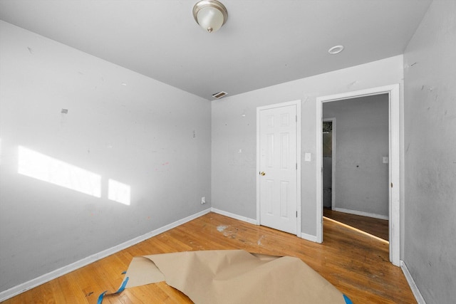 16159 Wood St, Markham, IL 60428 - empty room featuring wood finished floors and baseboards