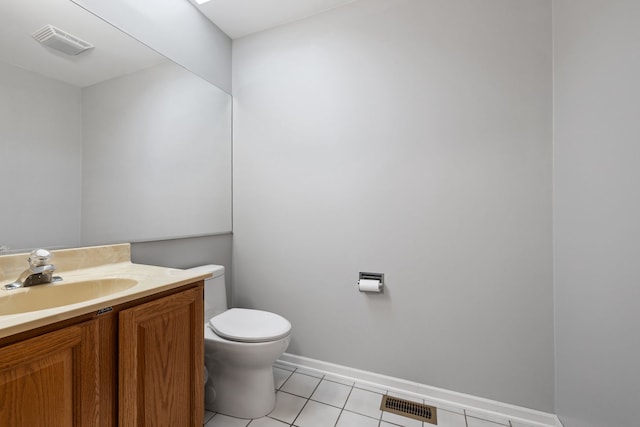 bathroom featuring tile patterned flooring, visible vents, vanity, and toilet