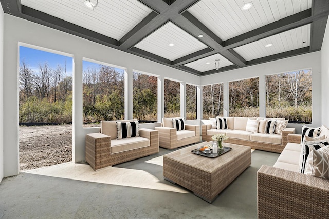 sunroom / solarium with a wealth of natural light, coffered ceiling, and beam ceiling
