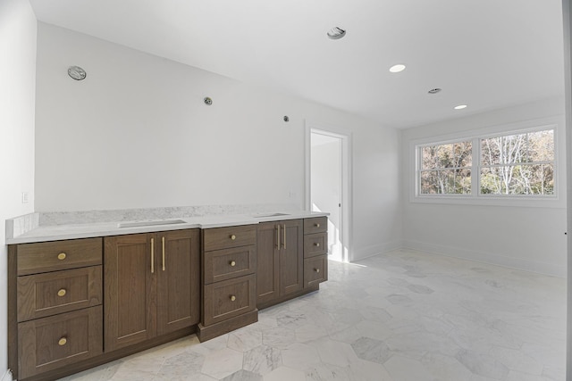 bar with recessed lighting, marble finish floor, and baseboards