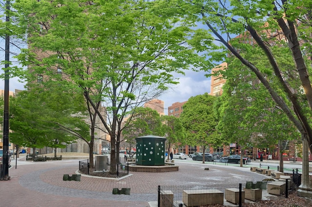 view of home's community with fence