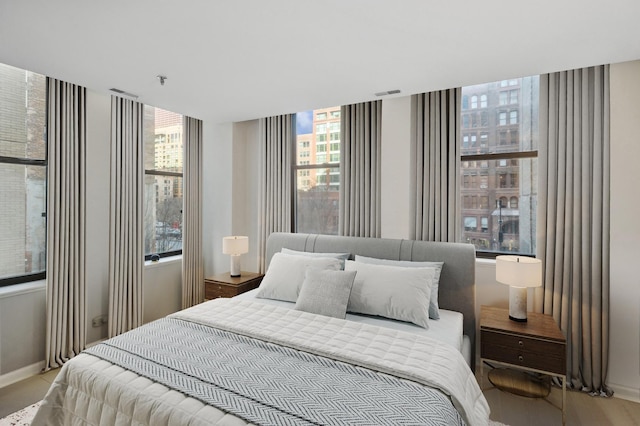 bedroom featuring baseboards