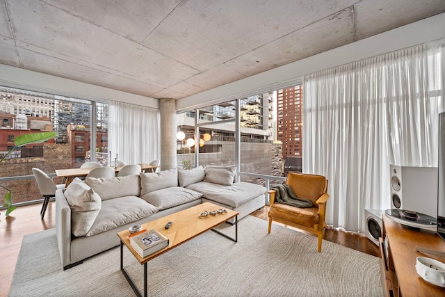 living area featuring plenty of natural light and wood finished floors