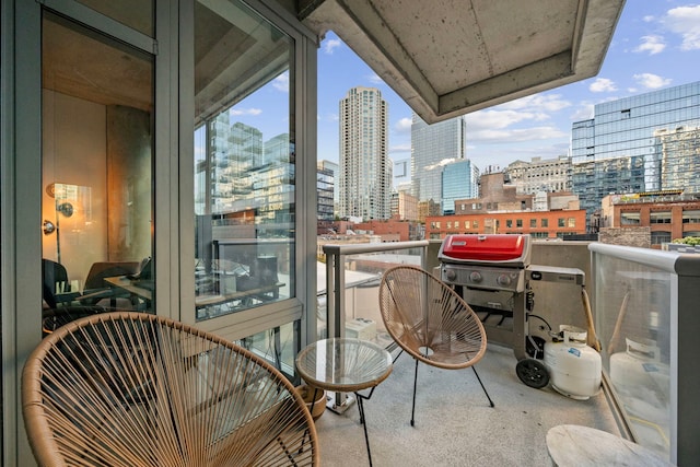 balcony featuring a grill and a city view