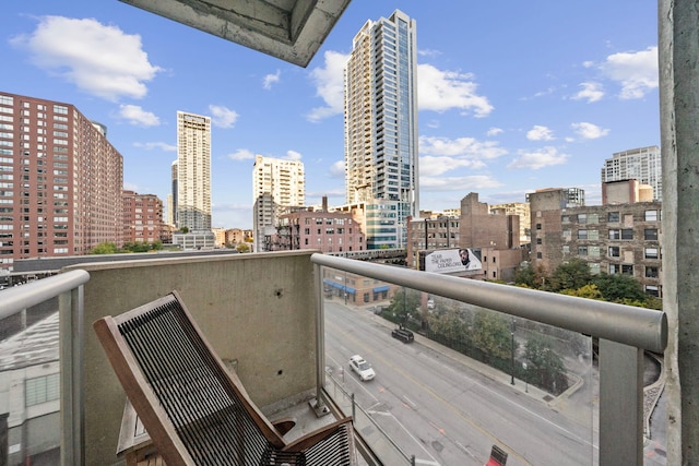 balcony featuring a view of city