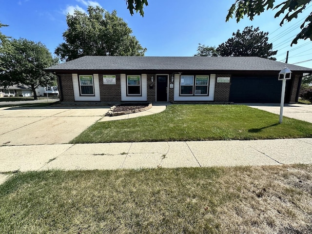 single story home featuring brick siding, roof with shingles, an attached garage, a front yard, and driveway