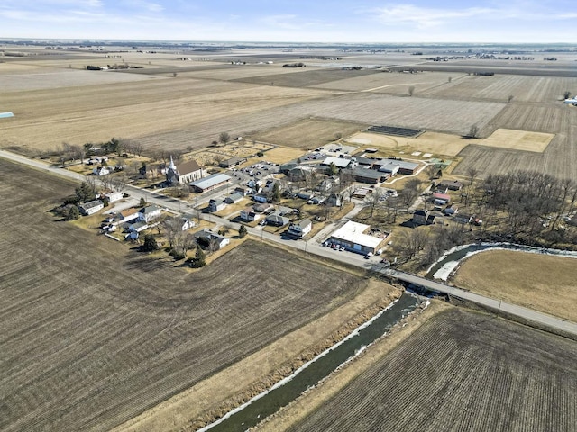 birds eye view of property featuring a rural view