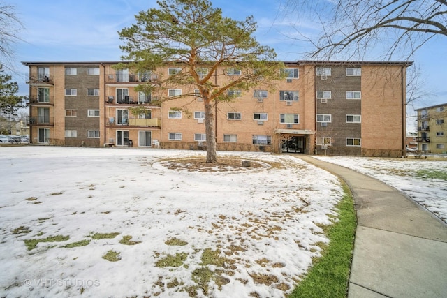 view of snow covered property