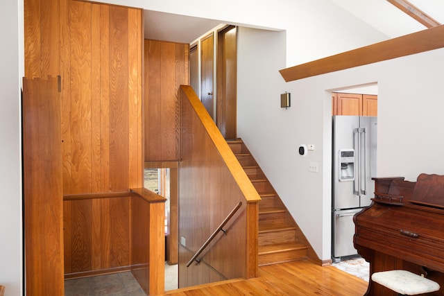 staircase featuring wood finished floors