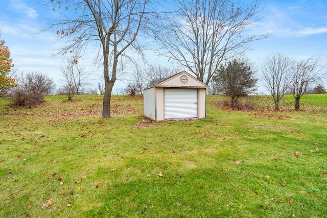 view of yard with an outbuilding and a rural view