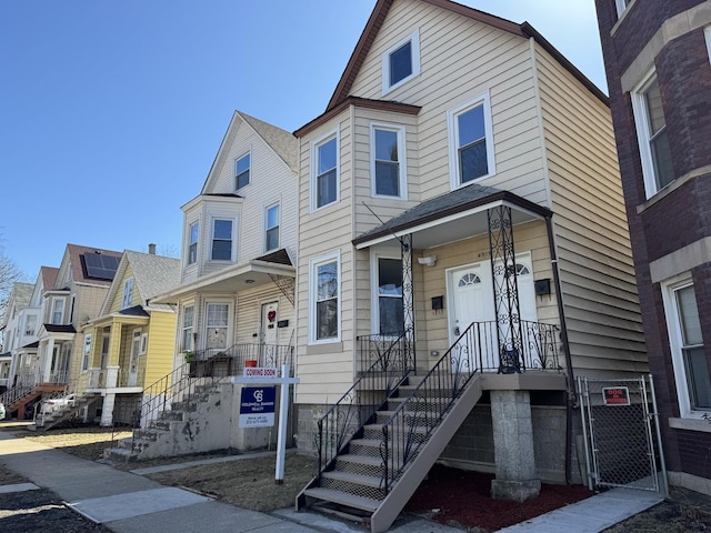 view of front of home with a residential view