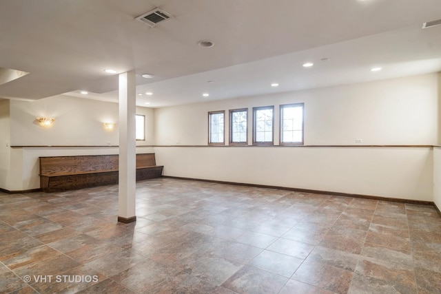 basement featuring recessed lighting, visible vents, and baseboards