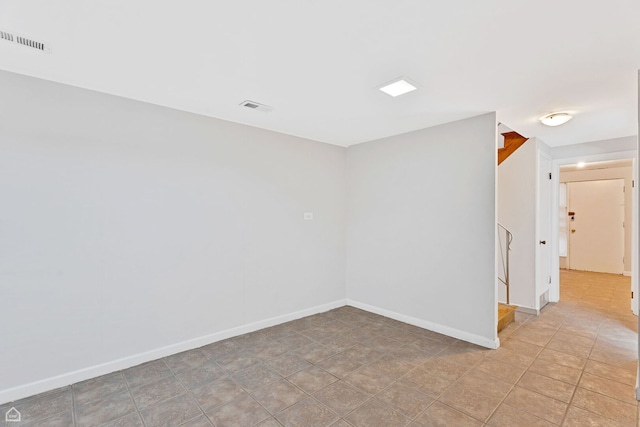 1652 W Jarvis Ave, Chicago, IL 60626 - spare room featuring visible vents and baseboards
