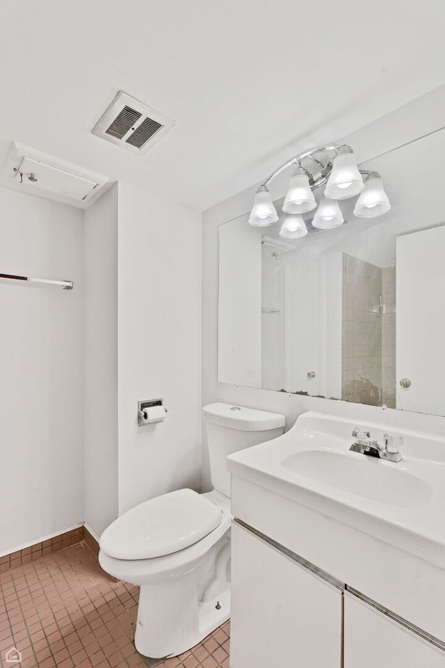 1652 W Jarvis Ave, Chicago, IL 60626 - full bath with visible vents, toilet, vanity, and baseboards