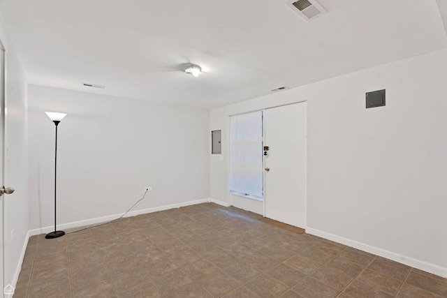 1652 W Jarvis Ave, Chicago, IL 60626 - empty room featuring electric panel, baseboards, and visible vents