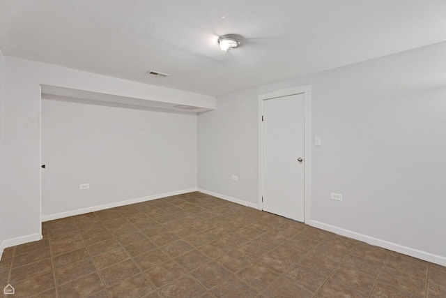 1652 W Jarvis Ave, Chicago, IL 60626 - empty room featuring tile patterned floors, baseboards, and visible vents