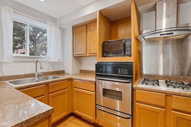 1652 W Jarvis Ave, Chicago, IL 60626 - kitchen featuring light countertops, a warming drawer, wall chimney exhaust hood, appliances with stainless steel finishes, and a sink