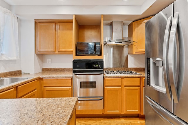 1652 W Jarvis Ave, Chicago, IL 60626 - kitchen with wall chimney range hood, a warming drawer, appliances with stainless steel finishes, light wood finished floors, and a sink