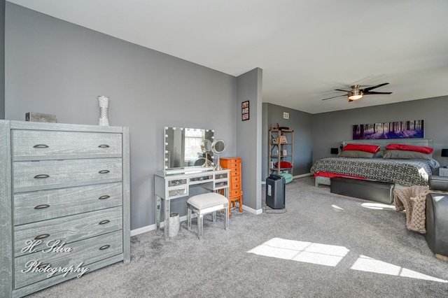 bedroom with a ceiling fan, carpet, and baseboards