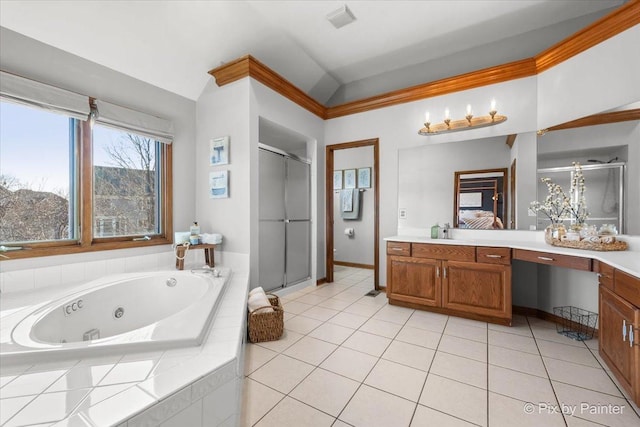 ensuite bathroom with a jetted tub, tile patterned flooring, vanity, and a shower stall