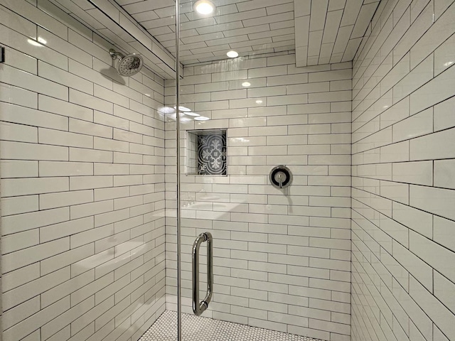 bathroom featuring a shower stall