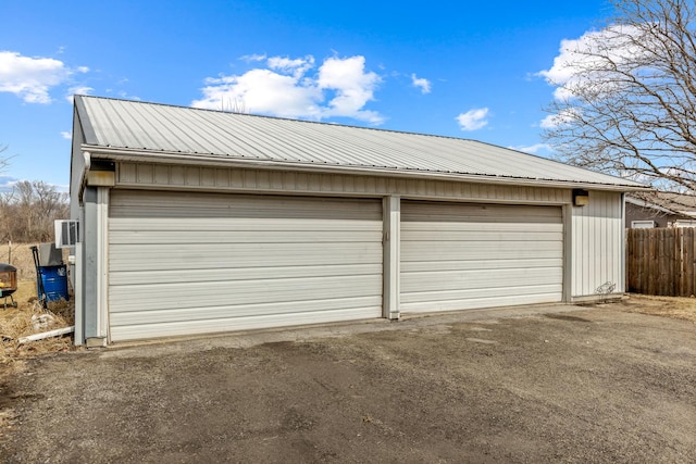 detached garage with fence