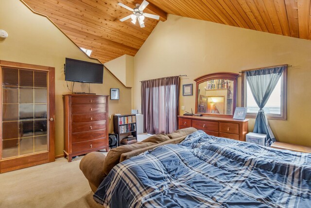 bedroom featuring carpet floors, beamed ceiling, wooden ceiling, and high vaulted ceiling