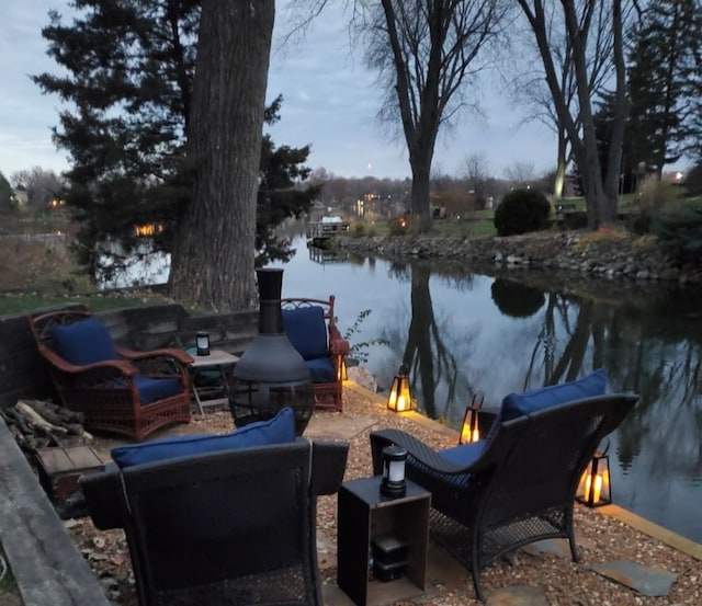 view of patio featuring a water view