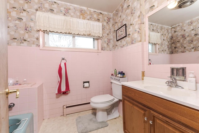 full bath featuring a baseboard heating unit, a wainscoted wall, and wallpapered walls