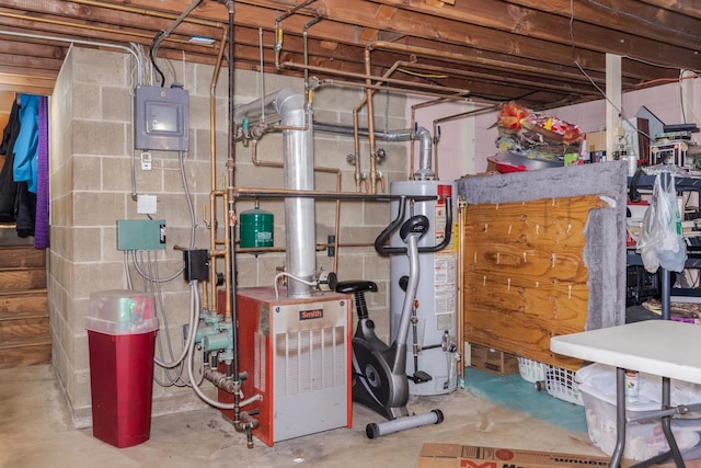 utility room featuring electric panel, a heating unit, and gas water heater