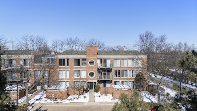 view of snow covered property