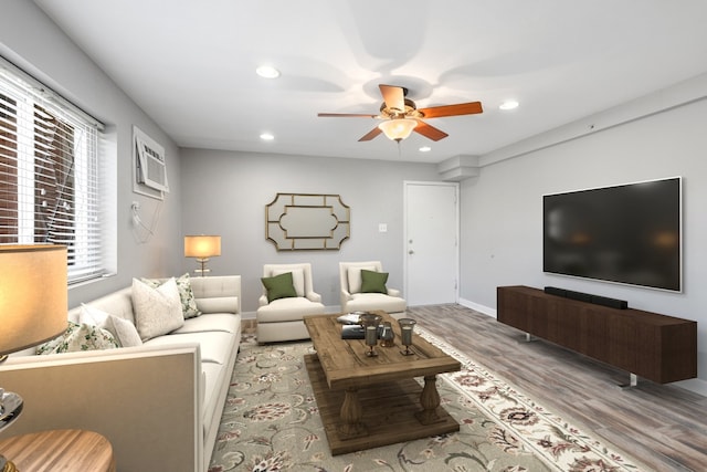 living room with recessed lighting, baseboards, light wood-style flooring, ceiling fan, and a wall mounted AC