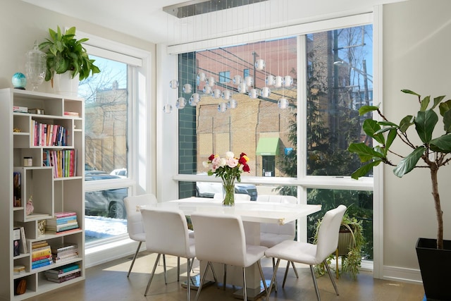 dining space with baseboards