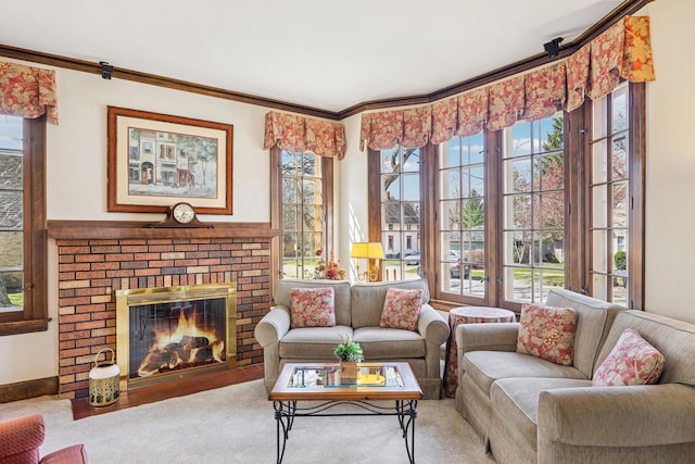 living room featuring crown molding, carpet floors, and a fireplace