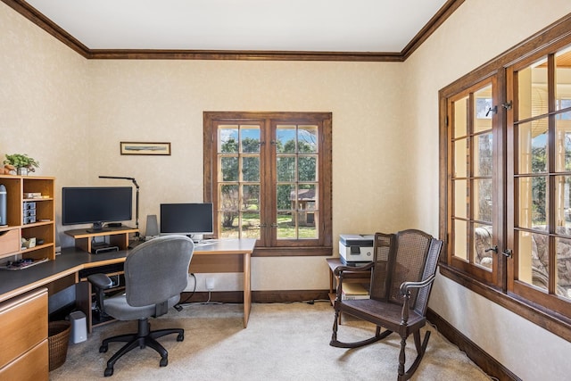 carpeted home office featuring french doors, baseboards, and ornamental molding