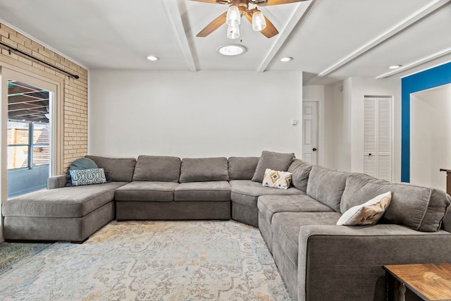 living room with brick wall, ceiling fan, beam ceiling, and recessed lighting