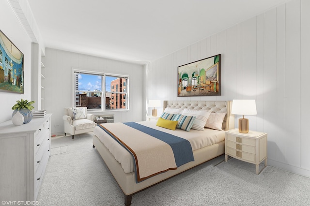 bedroom featuring light carpet