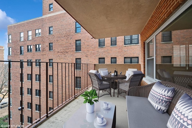 balcony featuring outdoor dining area