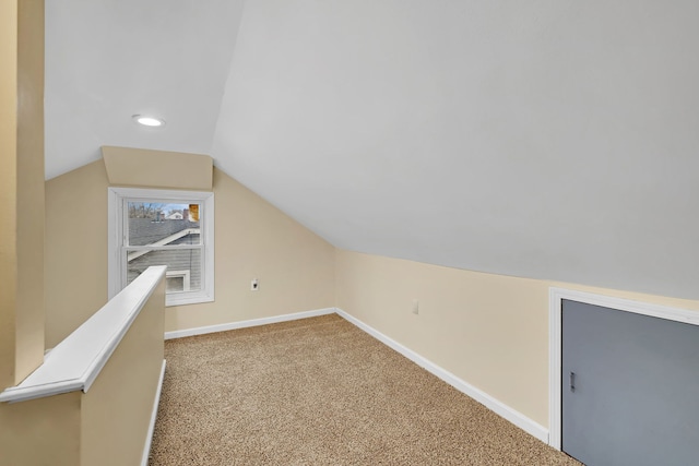 bonus room with vaulted ceiling, carpet floors, recessed lighting, and baseboards