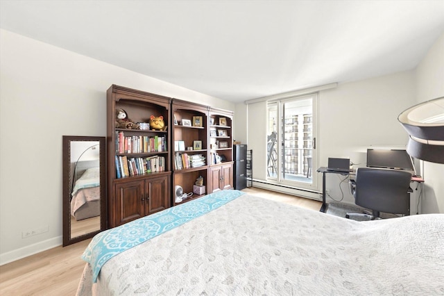 bedroom with light wood-style floors, a baseboard radiator, access to exterior, and baseboards