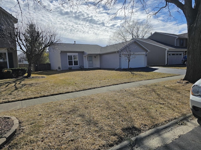 single story home featuring a garage, driveway, a front lawn, and fence