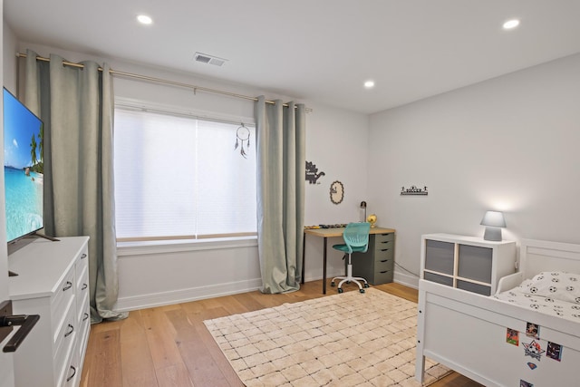 bedroom featuring recessed lighting, visible vents, and light wood-style flooring