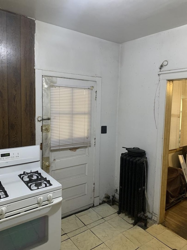 kitchen featuring white gas range