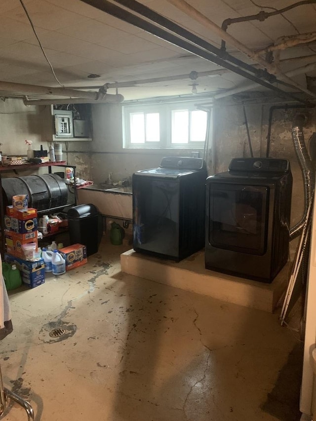 below grade area with a wood stove and independent washer and dryer